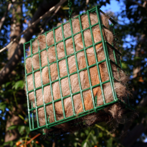 metal basket filled with alpaca fiber